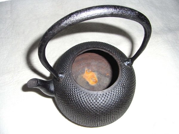 The rust in the iron teapot