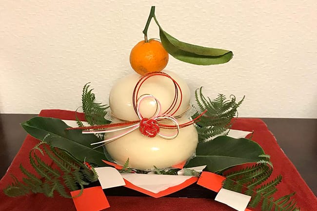 Japanese place Kagami Mochi at home as a new year decoration